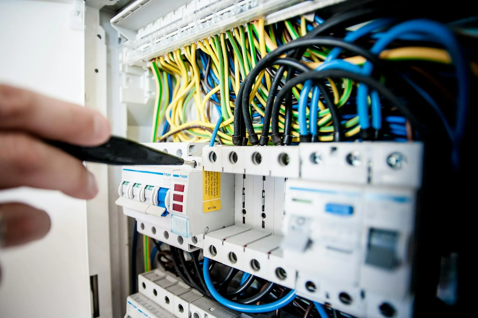 Electrician at switchboard