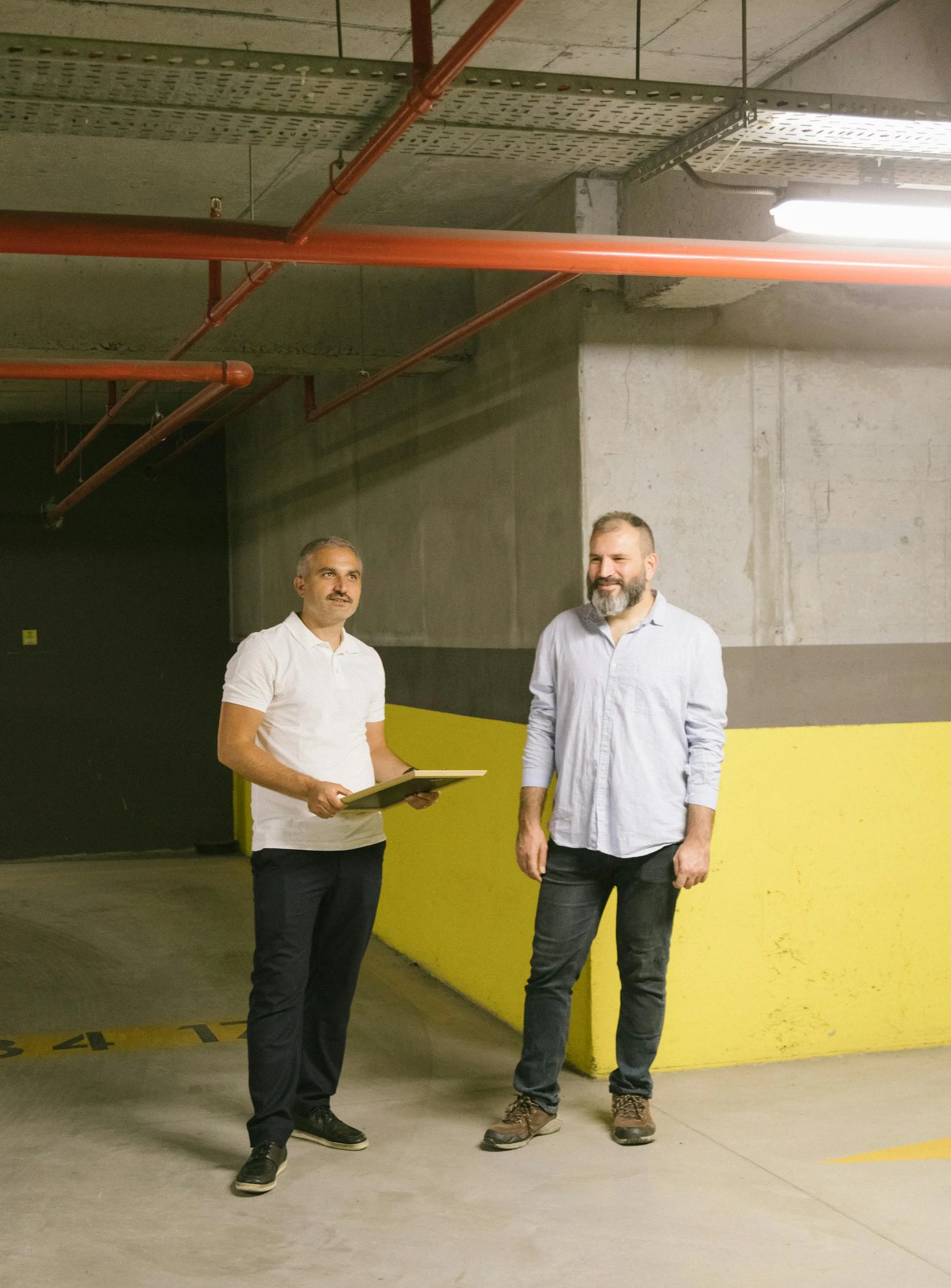 Fire risk surveyors in a building basement